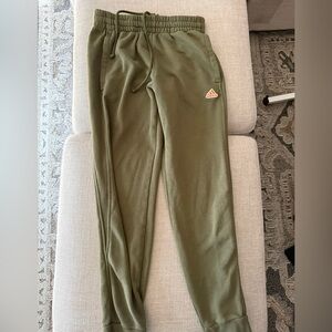 Green adidas sweatpants